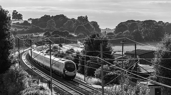 A train traveling through Britain's countryside.