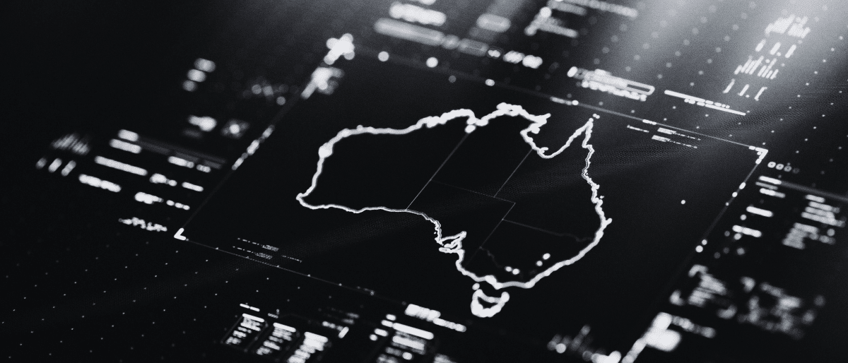 Outline map of Australia surrounded by data charts and binary code, representing technology